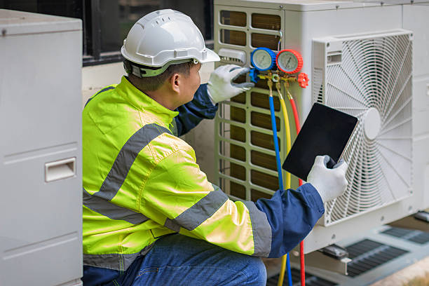 Professional Hvac technician working in Royal Palm Beach, FL